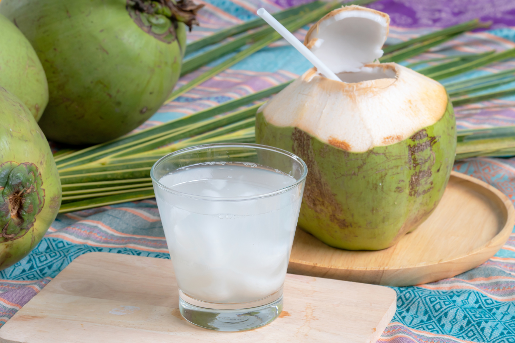 Diamond cut coconut served as a refreshing tropical drink.