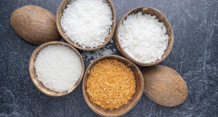 Various grades of desiccated coconut including fine, medium, flake, and chip for export.