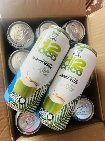 Custom coconut water packaging options including bottle, can, and glass designs