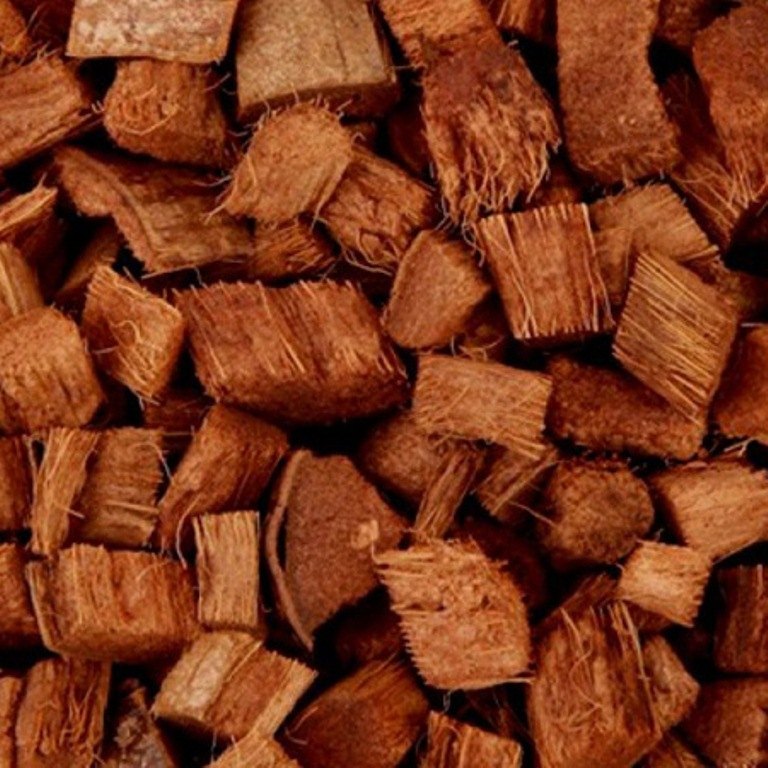 coco chips drying from coconut husk in Vietnam